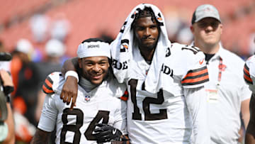 Cleveland Browns wide receiver Gage Larvadain and quarterback Shedeur Sanders walk off the field after the game between the Browns and the Los Angeles Rams at Huntington Bank Field.