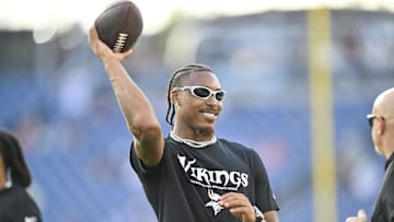  Minnesota Vikings wide receiver Justin Jefferson (18) throws to a fan against the Tennessee Titan during pre-game warmups at Nissan Stadium