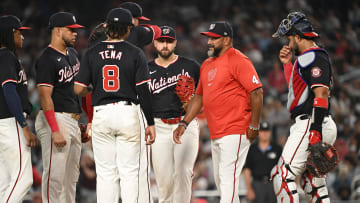 Aug 27, 2024; Washington, District of Columbia, USA; Washington Nationals manager Dave Martinez (4) walks to the mound to talk the his infield against the New York Yankees during the fifth inning at Nationals Park.