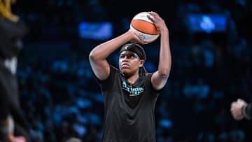 Jun 19, 2025; Brooklyn, New York, USA; New York Liberty center Jonquel Jones (35) warms up before a game against the Phoenix Mercury at Barclays Center. Mandatory Credit: John Jones-Imagn Images