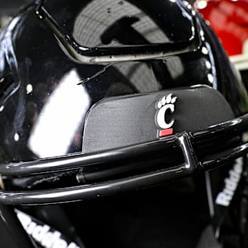 Jul 13, 2023; Arlington, TX, USA; A view of the Cincinnati Bearcats helmet and logo during the Big 12 football media day at AT&T Stadium. Mandatory Credit: Jerome Miron-Imagn Images