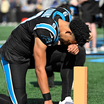 Nov 9, 2025; Charlotte, North Carolina, USA; Carolina Panthers quarterback Bryce Young (9) reflects before the game at Bank of America Stadium. Mandatory Credit: Bob Donnan-Imagn Images
