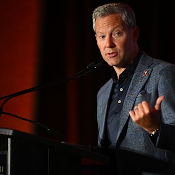 Oct 8, 2025; Charlotte, NC, USA; Virginia head coach Ryan Odom answers questions from the media at The Hilton Charlotte Uptown. Mandatory Credit: William Howard-Imagn Images