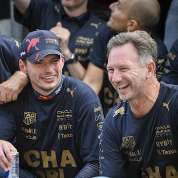 Oct 23, 2022; Austin, Texas, USA; (from left) Red Bull team advisor Helmut Marko and Red Bull Racing Limited driver Max Verstappen of Team Netherlands and Team Principal Christian Horner celebrate winning the U.S. Grand Prix F1 race at Circuit of the Americas. Mandatory Credit: Jerome Miron-Imagn Images
