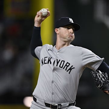 Sep 2, 2024; Arlington, Texas, USA; New York Yankees relief pitcher Clay Holmes (35) pitches against the Texas Rangers during the ninth inning at Globe Life Field.