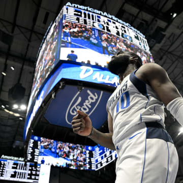 Jan 7, 2024; Dallas, Texas, USA; Dallas Mavericks forward Tim Hardaway Jr. (10) reacts to making a basket against the Minnesota Timberwolves during the second half at the American Airlines Center. Mandatory Credit: Jerome Miron-USA TODAY Sports