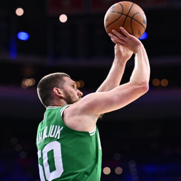 Oct 11, 2023; Philadelphia, Pennsylvania, USA; Boston Celtics guard Svi Mykhailiuk (50) shoots against the Philadelphia 76ers in the second quarter at Wells Fargo Center. Mandatory Credit: Kyle Ross-USA TODAY Sports