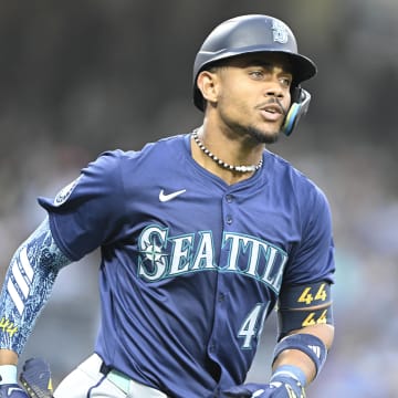 Seattle Mariners center fielder Julio Rodriguez rounds the bases after hitting a solo home run against the San Diego Padres on June 9.