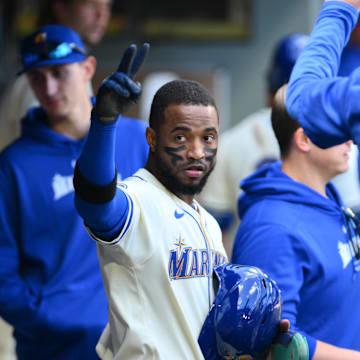 Seattle Mariners right fielder Victor Robles (10) celebrates after scoring a run against the Oakland Athletics during the fifth inning at T-Mobile Park in 2024.