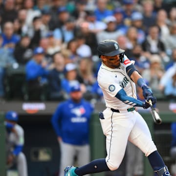 Seattle Mariners center fielder Julio Rodriguez (44) hits a single against the Toronto Blue Jays during the fourth inning at T-Mobile Park on May 10.