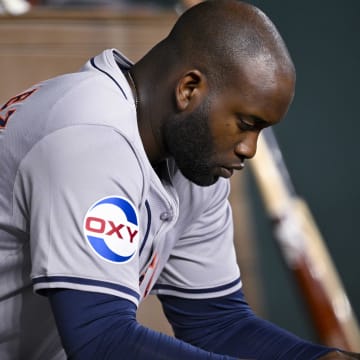 Aug 5, 2024; Arlington, Texas, USA; Houston Astros designated hitter Yordan Alvarez (44) checks the team computer during the third inning against the Texas Rangers at Globe Life Field. Mandatory Credit: Jerome Miron-USA TODAY Sports