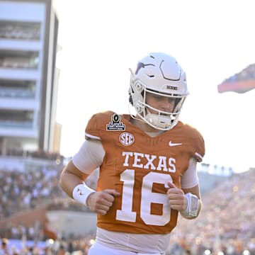 Dec 21, 2024; Austin, Texas, USA; Texas Longhorns quarterback Arch Manning (16) takes the field before the game between the Texas Longhorns and the Clemson Tigers in the CFP National Playoff First Round at Darrell K Royal-Texas Memorial Stadium. Mandatory Credit: Jerome Miron-Imagn Images