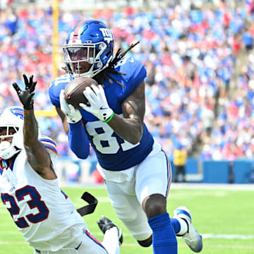 New York Giants wide receiver Lil'Jordan Humphrey (81) catches a pass for a touchdown as Buffalo Bills cornerback Dane Jackson (23) defends in the second quarter