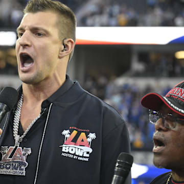 Dec 16, 2023; Inglewood, CA, USA; Rob Gronkowski (middle) sings the during the National Anthem with the New Directions Veterans Choir before the Starco Brands LA Bowl at SoFi Stadium. Gronkowski is the host of the game.