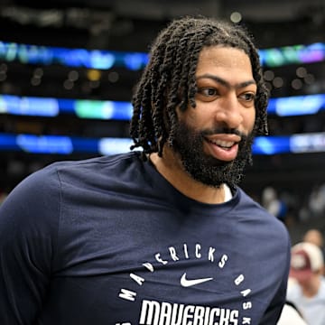 Anthony Davis walks off the court after a game against the Raptors.