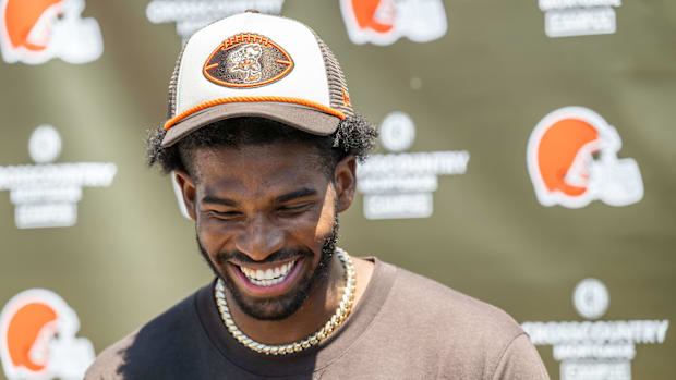 Cleveland Browns quarterback Shedeur Sanders (12) jokes about his signing bonus during a press conference before day two of N
