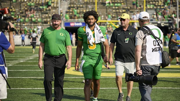 Sep 6, 2025; Eugene, Oregon, USA; Oregon Ducks quarterback Dante Moore (5) walks off the field after a game against the Oklah