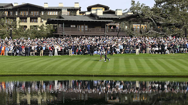 Tony Finau walks on the 18th hole during the final round of The Genesis Invitational golf tournament at Torrey Pines. 