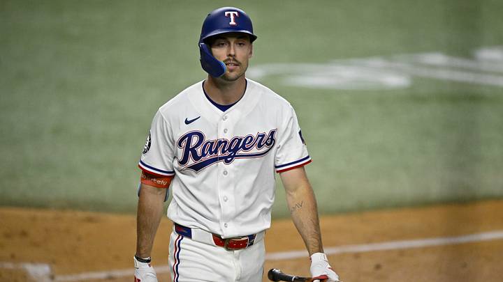Apr 21, 2026; Arlington, Texas, USA; Texas Rangers center fielder Evan Carter (32) looks on during the game between the Rangers and the Pirates at Globe Life Field. Mandatory Credit: Jerome Miron-Imagn Images