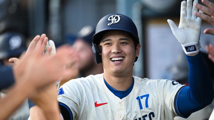 Jun 22, 2024; Los Angeles, California, USA; Los Angeles Dodgers designated hitter Shohei Ohtani (17) celebrates with teammates after hitting a home run against the Los Angeles Angels during the third inning at Dodger Stadium. Mandatory Credit: Jonathan Hui-USA TODAY Sports