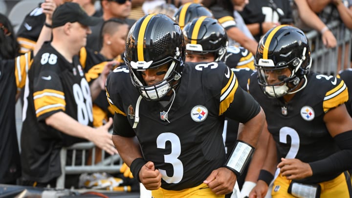 Aug 9, 2024; Pittsburgh, Pennsylvania, USA; Pittsburgh Steelers quarterback Russell Wilson (3) and Justin Fields (2) take the field for pre-game against the Houston Texans at Acrisure Stadium. Mandatory Credit: Barry Reeger-USA TODAY Sports