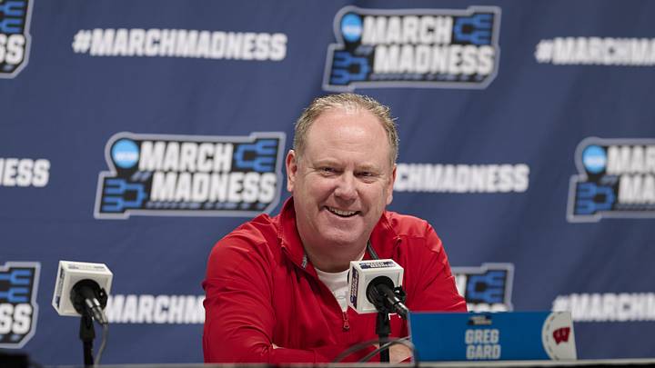 Mar 18, 2026; Portland, OR, USA; Wisconsin Badgers head coach Greg Gard answers questions from the media before a practice session ahead of the first round of the men's 2026 NCAA Tournament at Moda Center. Mandatory Credit: Troy Wayrynen-Imagn Images