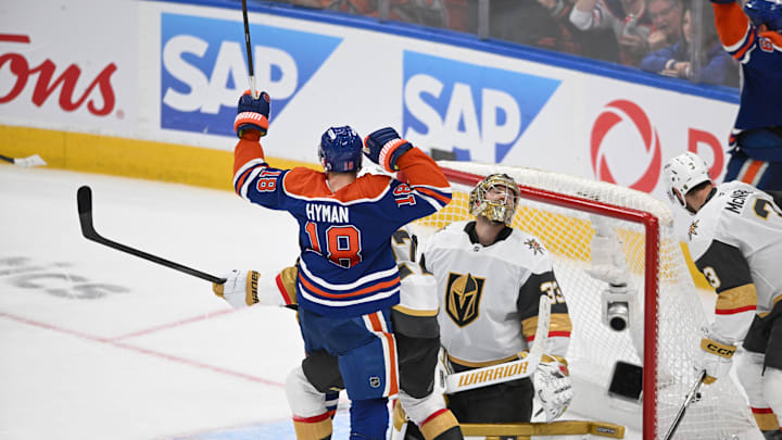 Edmonton Oilers left winger Zach Hyman (18) reacts to a goal on Vegas Golden Knights goalie Adin Hill (33)