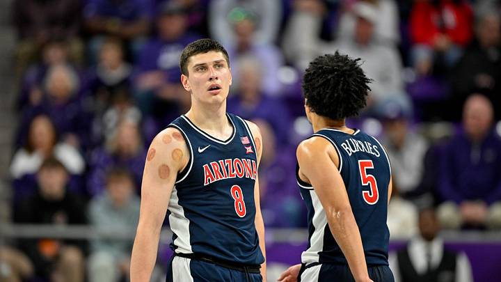 Arizona Wildcats forward Ivan Kharchenkov (8) and guard Brayden Burries (5) 