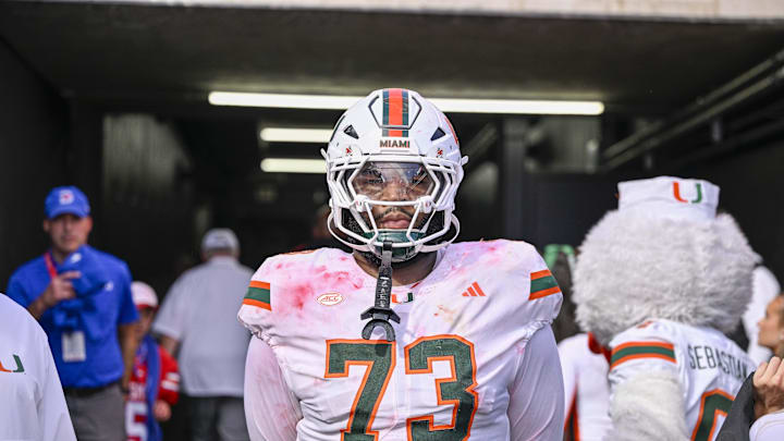 Nov 1, 2025; Dallas, Texas, USA;  Miami Hurricanes offensive lineman Anez Cooper (73) looks on from the tunnel as the SMU Mustangs celebrate the victory over the Hurricanes during the overtime period  at Gerald J. Ford Stadium. Mandatory Credit: Jerome Miron-Imagn Images