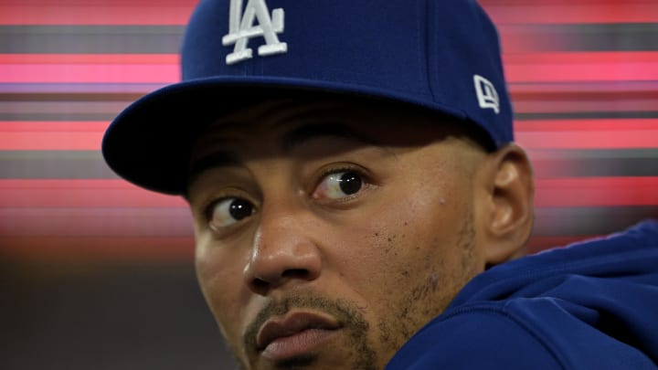 Aug 5, 2024; Los Angeles, California, USA;  Los Angeles Dodgers second baseman Mookie Betts (50) looks on from the dugout against the Philadelphia Phillies at Dodger Stadium. Mandatory Credit: Jayne Kamin-Oncea-USA TODAY Sports