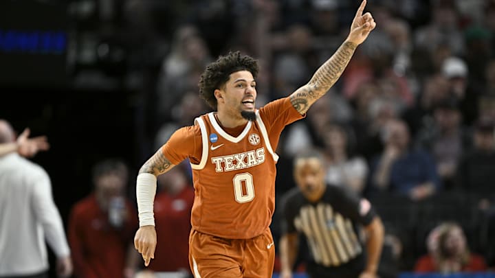Mar 21, 2026; Portland, OR, USA; Texas Longhorns guard Jordan Pope (0) reacts after a basket against the Gonzaga Bulldogs during the second round of the NCAA Tournament.