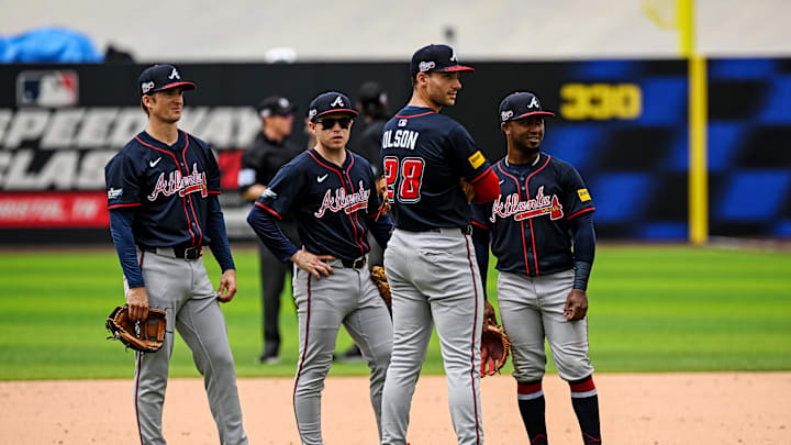 Aug 3, 2025; Bristol, Tennessee, USA; Atlanta Braves infield watching relief pitcher warming up Atlanta Braves first base Matt Olson (28), Atlanta Braves shortstop Nick Allen (2), Atlanta Braves second base Ozzie Albies (1), and Atlanta Braves third base Austin Riley (27) at Bristol Motor Speedway. Mandatory Credit: Bryan Lynn-Imagn Images