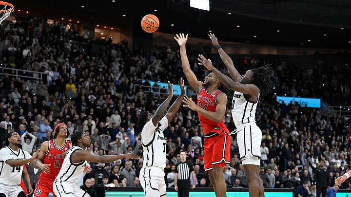 Dec 20, 2024; Providence, Rhode Island, USA; St. John's basketball forward Zuby Ejiofor (24) scores in the final seconds of the second half to beat the Providence Friars at Amica Mutual Pavilion. 