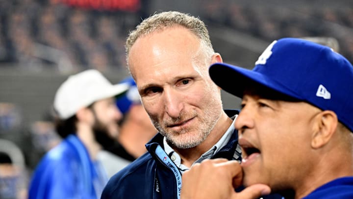 Oct 31, 2025; Toronto, Ontario, CAN; Toronto Blue Jays president Mark Shapiro speaks with Los Angeles Dodgers manager Dave Roberts (30) before game six of the 2025 MLB World Series at Rogers Centre. Mandatory Credit: Dan Hamilton-Imagn Images