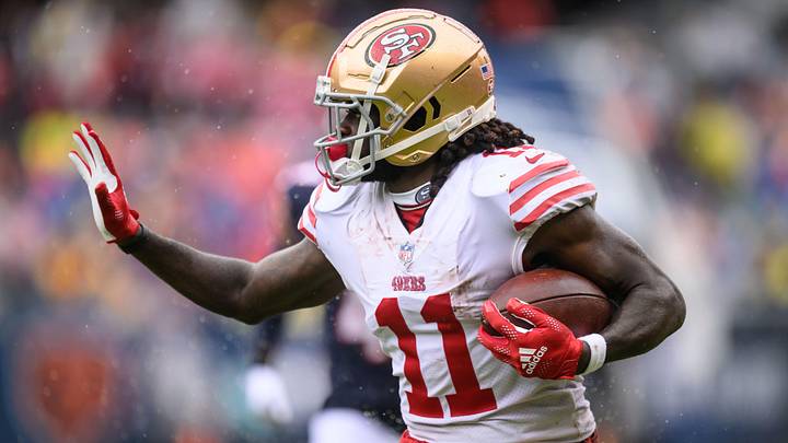 Sep 11, 2022; Chicago, Illinois, USA; San Francisco 49ers wide receiver Brandon Aiyuk (11) runs after a catch in the first quarter against the Chicago Bears at Soldier Field. Mandatory Credit: Daniel Bartel-USA TODAY Sports