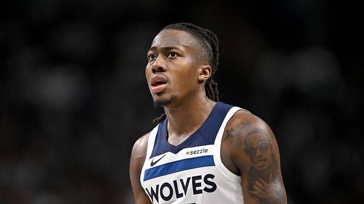 Mar 30, 2026; Dallas, Texas, USA; Minnesota Timberwolves guard Ayo Dosunmu (13) looks on during the second half against the Dallas Mavericks at the American Airlines Center. Mandatory Credit: Jerome Miron-Imagn Images