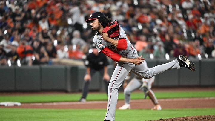 Jun 27, 2026; Baltimore, Maryland, USA;  Washington Nationals pitcher Justin Lawrence (44) delivers a pitch during the tenth inning against the Baltimore Orioles at Oriole Park at Camden Yards. Mandatory Credit: James A. Pittman-Imagn Images