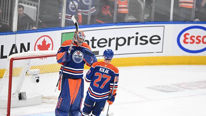 May 12, 2025; Edmonton, Alberta, CAN;  Edmonton Oilers goalie Stuart Skinner (74) celebrates their win with defenseman Brett Kulak (27) over the Las Vegas Golden Knights during the third period in game three of the second round of the 2025 Stanley Cup Playoffs at Rogers Place. Mandatory Credit: Walter Tychnowicz-Imagn Images
