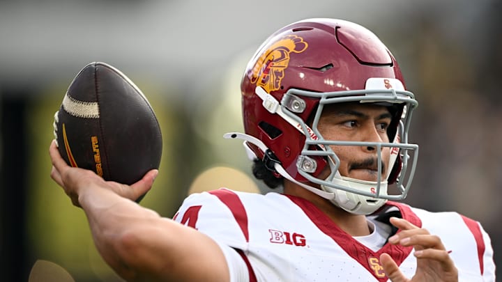Sep 13, 2025; West Lafayette, Indiana, USA; Southern California Trojans quarterback Jayden Maiava (14) warms up on the sidelines during the first quarter against the Purdue Boilermakers at Ross-Ade Stadium. Mandatory Credit: Marc Lebryk-Imagn Images