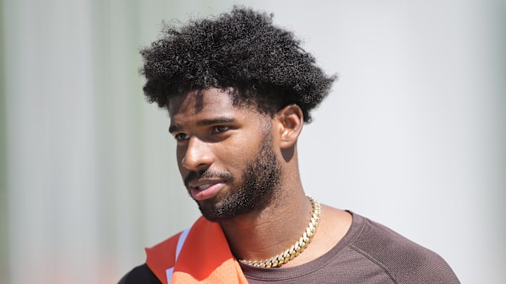 May 9, 2025; Berea, OH, USA; Cleveland Browns quarterback Shedeur Sanders (12) walks off the field after rookie minicamp at CrossCountry Mortgage Campus. May 9, 2025; Berea, OH, USA; Cleveland Browns quarterback Shedeur Sanders (12) walks off the field after rookie minicamp at CrossCountry Mortgage Campus.