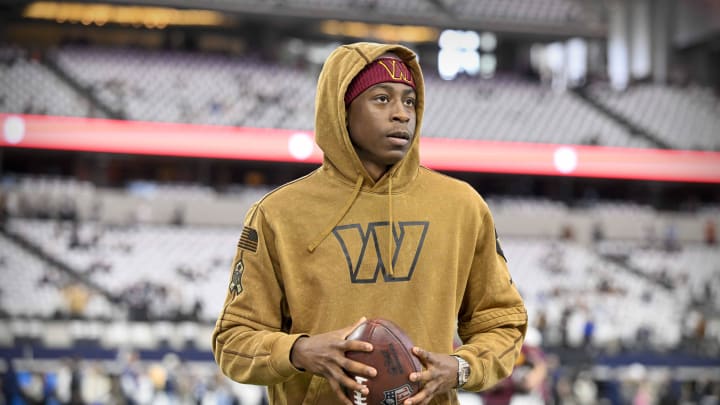 Nov 23, 2023; Arlington, Texas, USA; Washington Commanders cornerback Emmanuel Forbes (13) warms up before the game between the Dallas Cowboys and the Washington Commanders at AT&T Stadium. Mandatory Credit: Jerome Miron-USA TODAY Sports