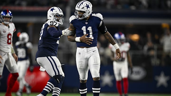 Dallas Cowboys linebacker Micah Parsons and defensive tackle Osa Odighizuwa celebrates after Parsons sacks New York Giants quarterback Daniel Jones. Dallas Cowboys linebacker Micah Parsons and defensive tackle Osa Odighizuwa celebrates after Parsons sacks New York Giants quarterback Daniel Jones.