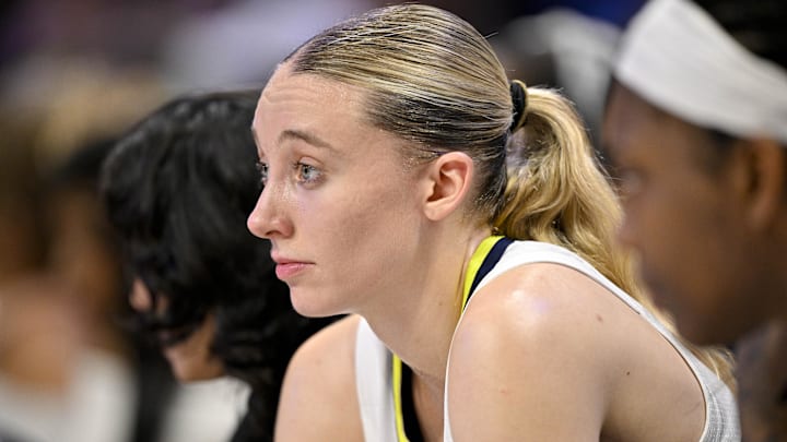 Dallas Wings guard Paige Bueckers looks on from the team bench during the second half against the Phoenix Mercury