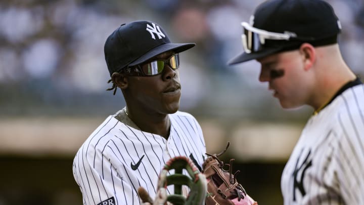 Aug 10, 2024; Bronx, New York, USA; New York Yankees third baseman Jazz Chisholm Jr. (13) slaps hands with New York Yankees outfielder Alex Verdugo (24) after the third inning against the Texas Rangers at Yankee Stadium. Mandatory Credit: John Jones-USA TODAY Sports