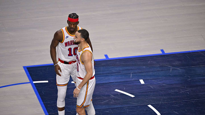 Feb 12, 2025; Dallas, Texas, USA; Golden State Warriors forward Jimmy Butler (10) and guard Stephen Curry (30) during the game between the Dallas Mavericks and the Golden State Warriors at the American Airlines Center. Mandatory Credit: Jerome Miron-Imagn Images