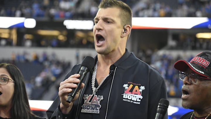 Dec 16, 2023; Inglewood, CA, USA; Rob Gronkowski (middle) sings the during the National Anthem with the New Directions Veterans Choir before the Starco Brands LA Bowl at SoFi Stadium. Gronkowski is the host of the game.