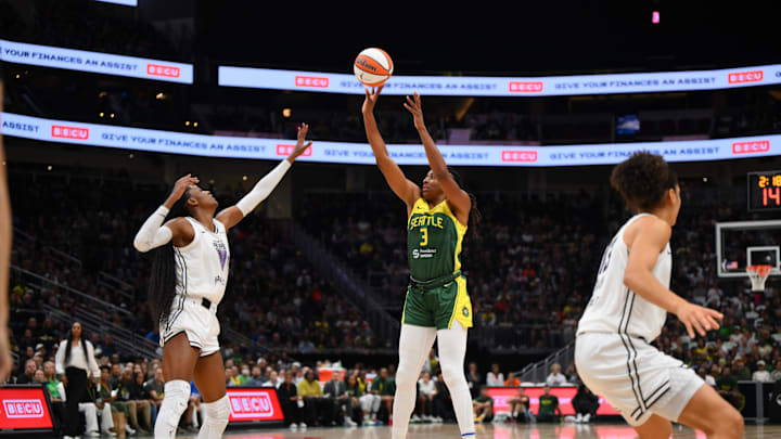 Sep 9, 2025; Seattle, Washington, USA; Seattle Storm forward Nneka Ogwumike (3) shoots the ball over Golden State Valkyries center Temi Fagbenle (14) during the first half at Climate Pledge Arena. Mandatory Credit: Steven Bisig-Imagn Images