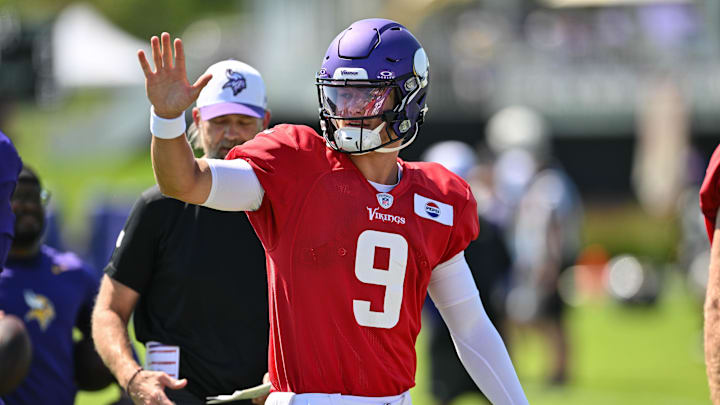 Minnesota Vikings quarterback J.J. McCarthy (9) looks on during practice at Vikings training camp in Eagan, MN. Minnesota Vikings quarterback J.J. McCarthy (9) looks on during practice at Vikings training camp in Eagan, MN.