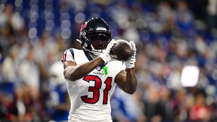 Jan 6, 2024; Indianapolis, Indiana, USA; Houston Texans running back Dameon Pierce (31) catches a pass during warm ups before a game against the Indianapolis Colts at Lucas Oil Stadium. Mandatory Credit: Marc Lebryk-USA TODAY Sports