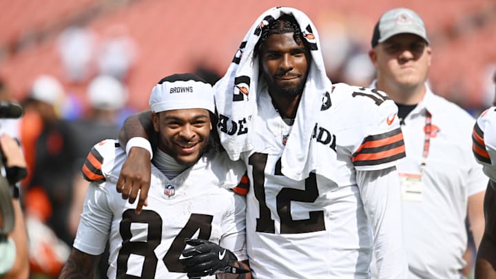Cleveland Browns wide receiver Gage Larvadain and quarterback Shedeur Sanders walk off the field after the game between the Browns and the Los Angeles Rams at Huntington Bank Field.